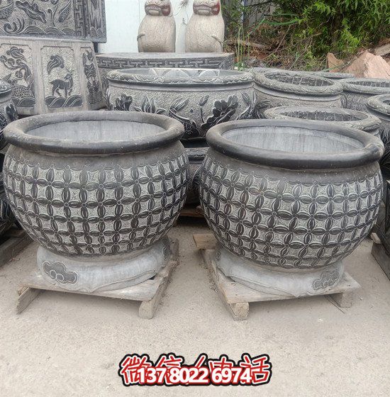 自然美學(xué)結(jié)合青石石雕、浮雕、編織、雕塑的戶外園林魚缸